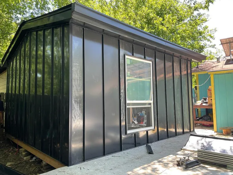 Black standing seam metal wall panels for Metal Roof Installation in Nixa